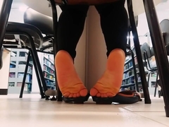Candid Hispanic student shoeplay