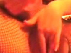 Masturbating In Fishnets With A Vibrator