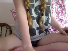 Pigtailed girl inserts her hairbrush in her virgin pussy