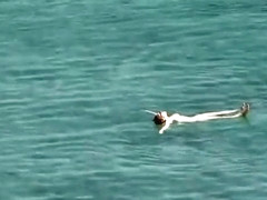 Nude woman blows and rides cock