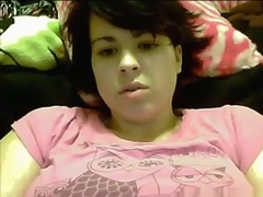 Hot girl plays with her busty pierced tits on cam