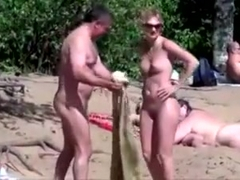 Nude beach - pointy little tits babe - embarrassed