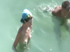 Small tits and puffy nipples nudist fucking in water
