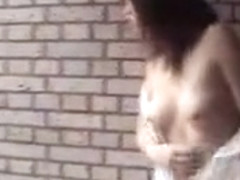 Slutty Asian girl in a sexy white dress fingers her hairy c